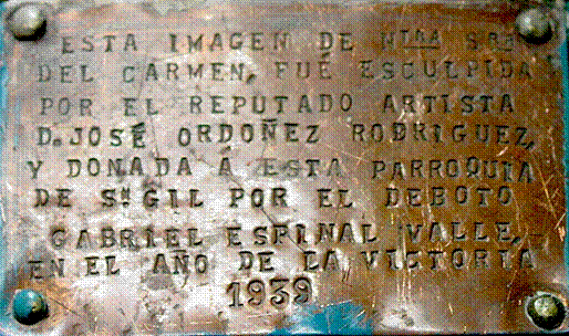 Placa metlica existente en la espalda de Ntra. Sra. del Carmen, colocada por N. H. D. Gabriel Espinal Valle, quien don la Sagrada Imagen, de la que era Prioste.