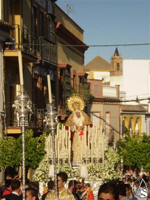 Procesin de la Virgen de la Caridad en una clida tarde de junio 