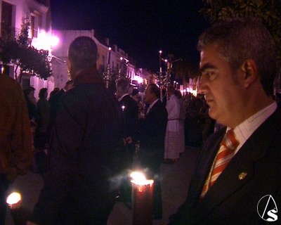  Miguel Bernal, Hno. Mayor de la Borriquita, acompaa al Cristo de la Salud